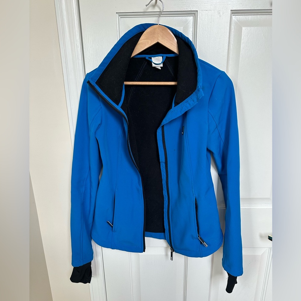 Blue soft shell fleece lined running jacket with thumb holes
